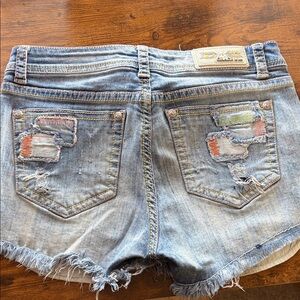 Light Wash Denim Cutoff Shorts with Embroidered Patch Detail